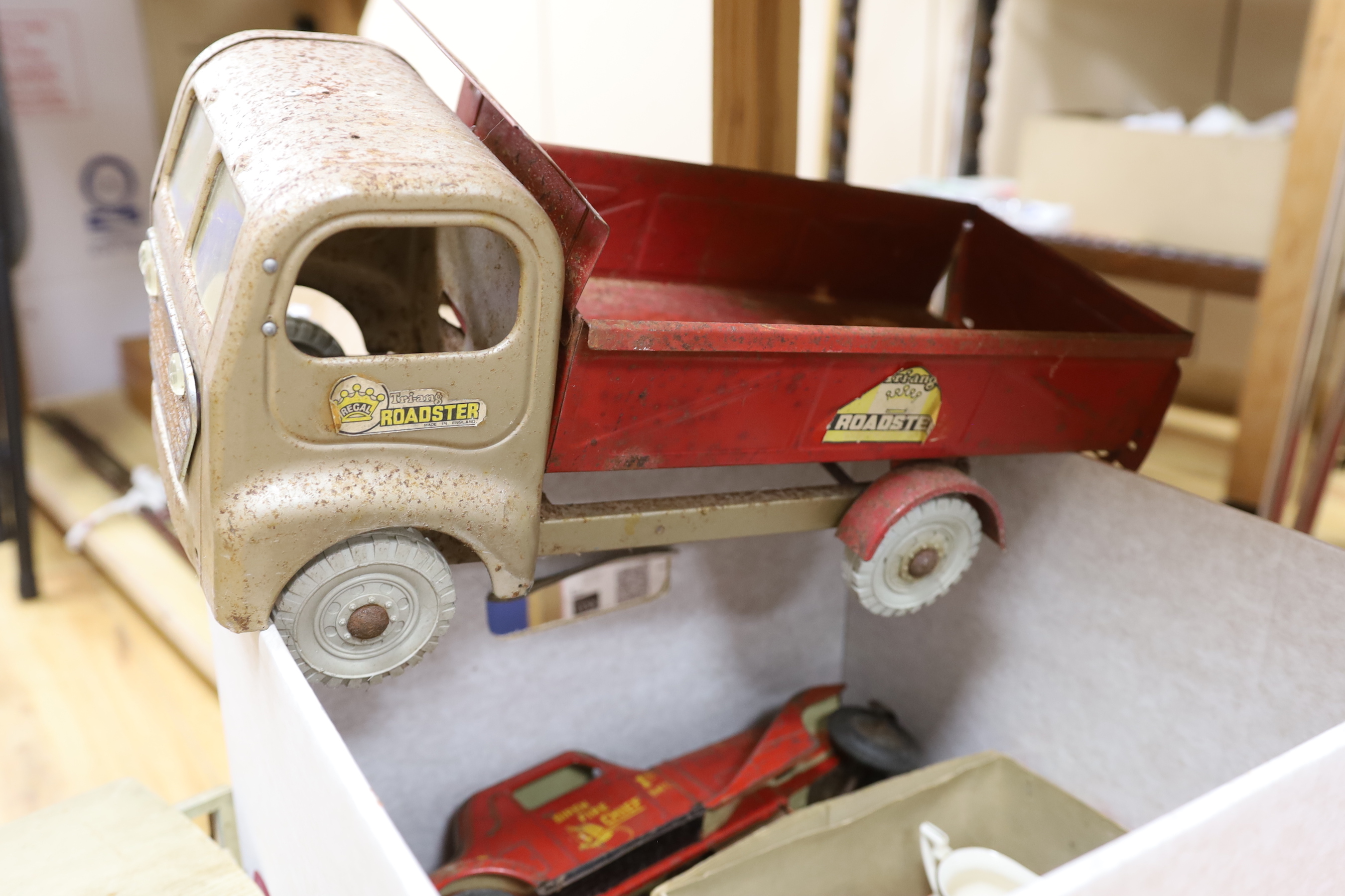 A tin plate model fire engine, lorry and bus, etc.